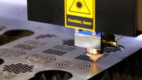 cnc laser cutting of metal, modern industrial technology.