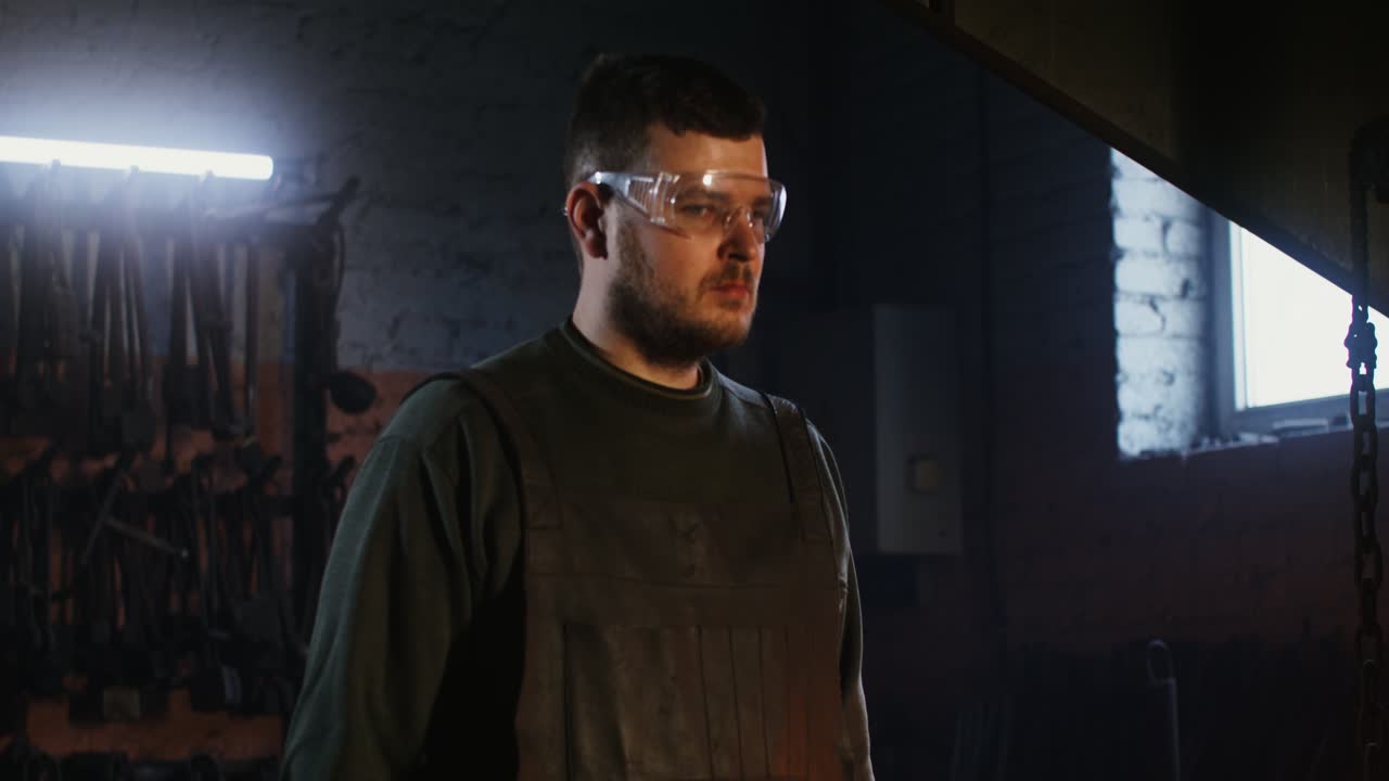 Blacksmith at Work in a Forge