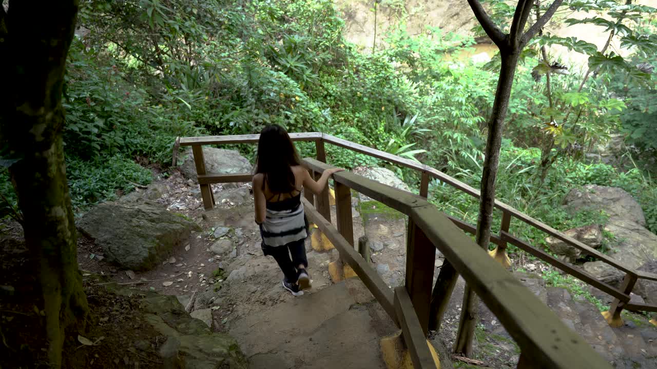 Young women exploring a beautiful  Caribbean forest