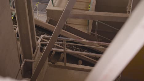 static view of industrial plant conveyor belt carry crushed rocks, czechia