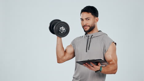 dumbbell, exercise and a man with clipboard