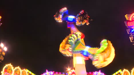 a tilt a whirl type ride at an amusement park or carnival