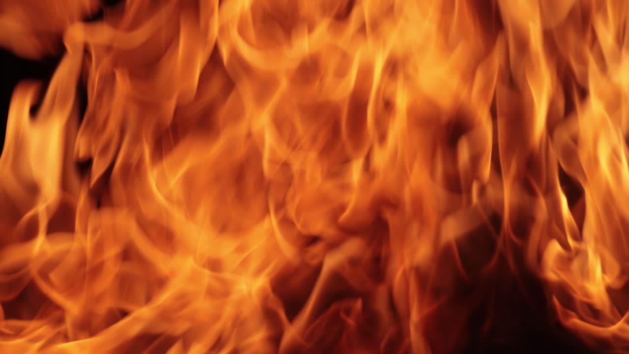 Flames of fire on black background in slow motion
