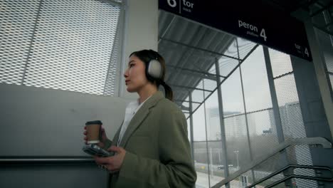 woman commuting in an urban station