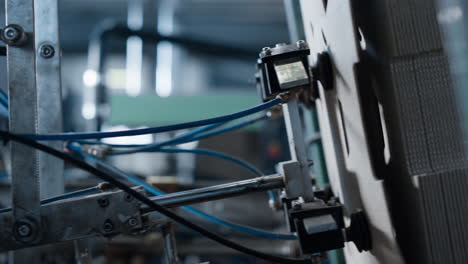 Manufacture cardbox packaging automat working process in modern facility closeup