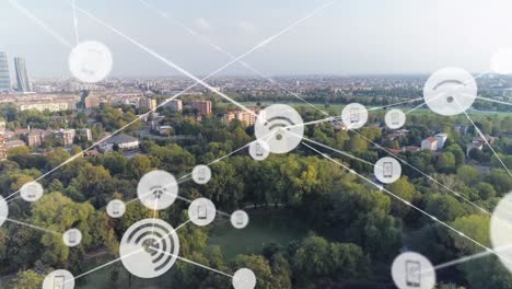 Animation of network of connections with icons over cityscape