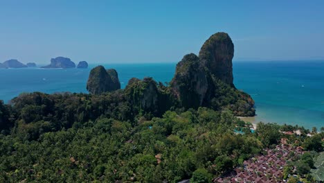 seascape and beautiful mountain cliff at railay beach in krabi, thailand - aerial drone shot