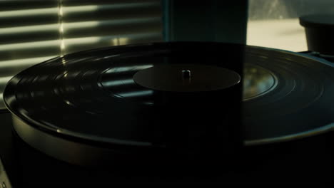 close-up of a vinyl record spinning on a turntable