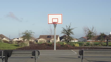 a basketball court in roseville, california on a cloudy day. perfect for sports-related videos, lifestyle content, or background footage.