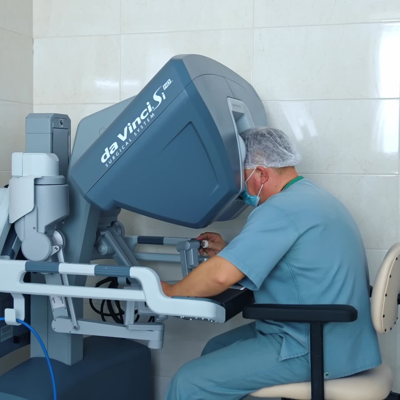 Robot surgery technology for surgeons. Doctor performs minimally invasive surgeon, using robotic device