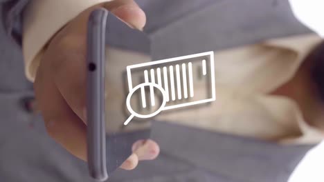 close up shot of businessman holding smartphone with digital effect on screen showing document and magnifier