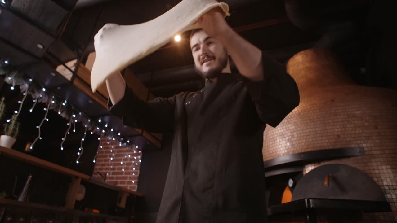 Pizza chef preparing pizza dough