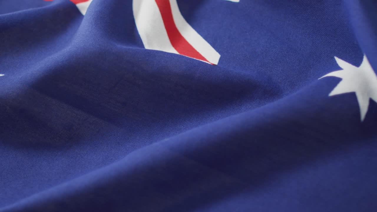 Close up of crumpled australian flag with white stars and stripes