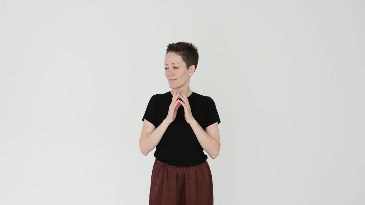 Portrait of a woman with brunette hair and brown skirt