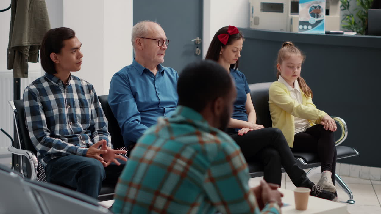 Diverse Group of People Waiting in a Clinic Waiting Room