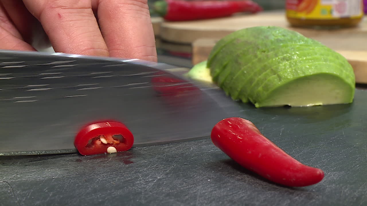 Preparing avocado and chili peppers