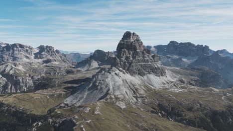 Orbit-shot-of-Tre-Cime-di-Lavaredo-mountain-peak-in-the-Dolomites,-Italy