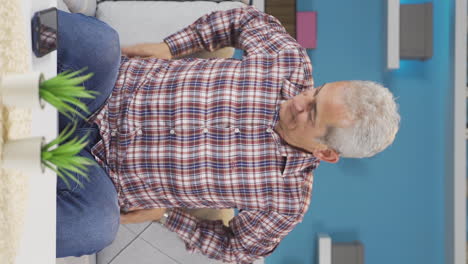 Vertical-video-of-Portrait-of-man-feeling-excited.