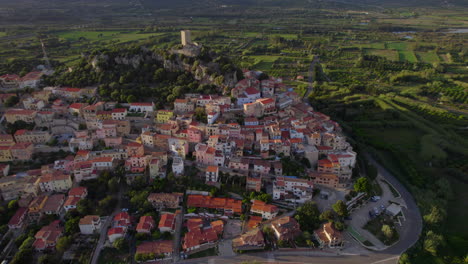 Fantastic-aerial-view-in-orbit-over-the-town-of-Posada-on-the-island-of-Sardinia-during-sunset