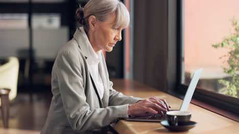 Business woman, laptop and workspace for online