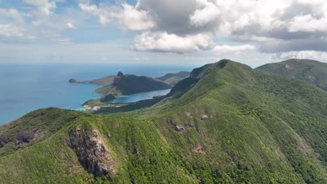 aerial view of lush green mountains and coastline