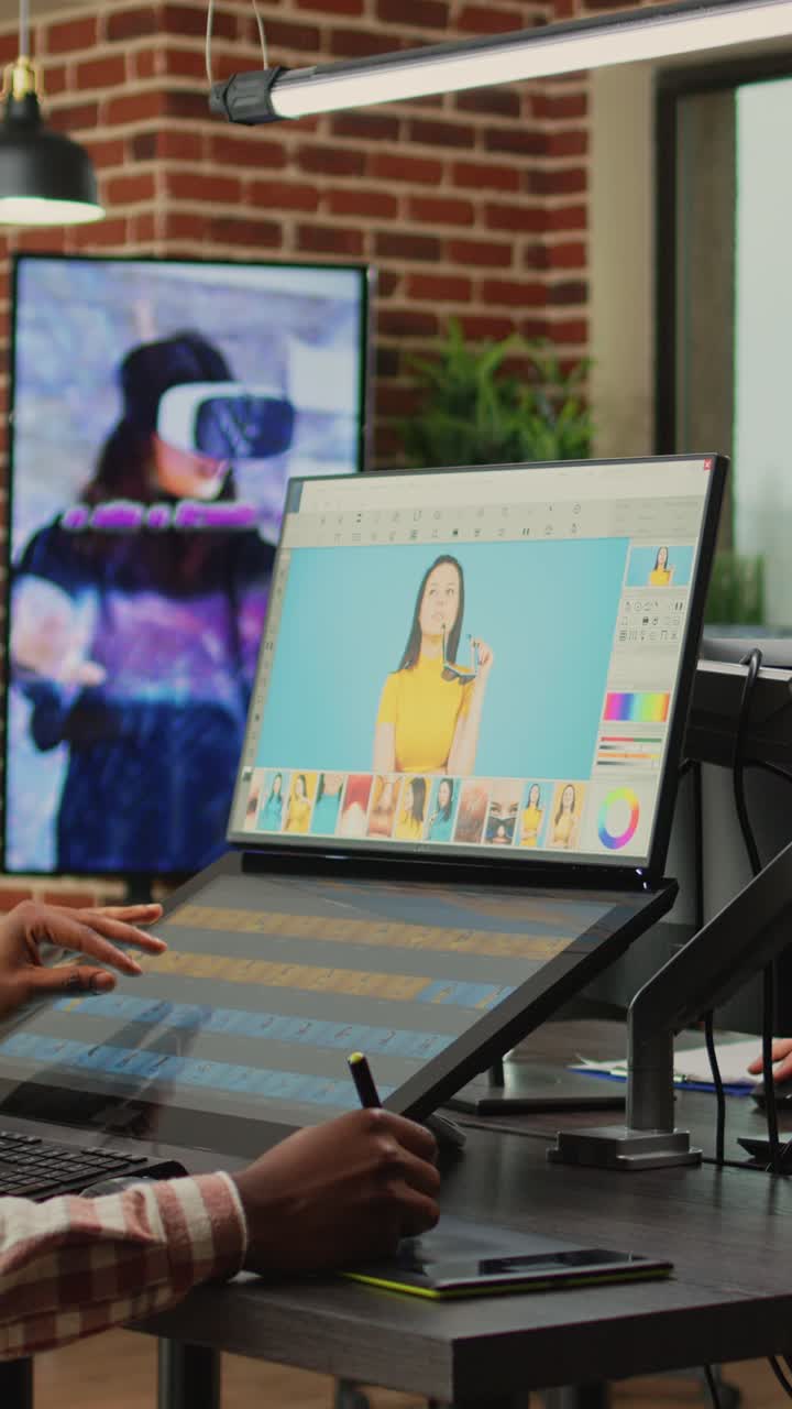 Vertical video: African american employee retouching professional photos