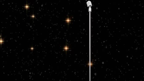 Animation-of-stars-falling-over-microphone-on-dark-background