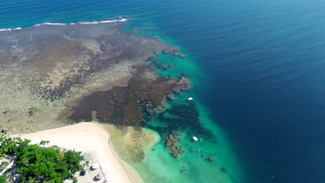 Aerial-drone-holiday-crystal-clear-reef-spot-Hideaway-Island-beach-snorkel-travel-tourism-sandy-coastline-Mele-Port-Vila-Vanuatu-destination-Pacific-Islands-4K