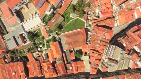 aerial view of an old european city with red tile roofs
