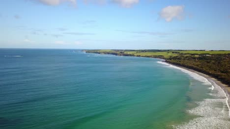 aerial footage over the ocean and coastline near inverloch, victoria, australia