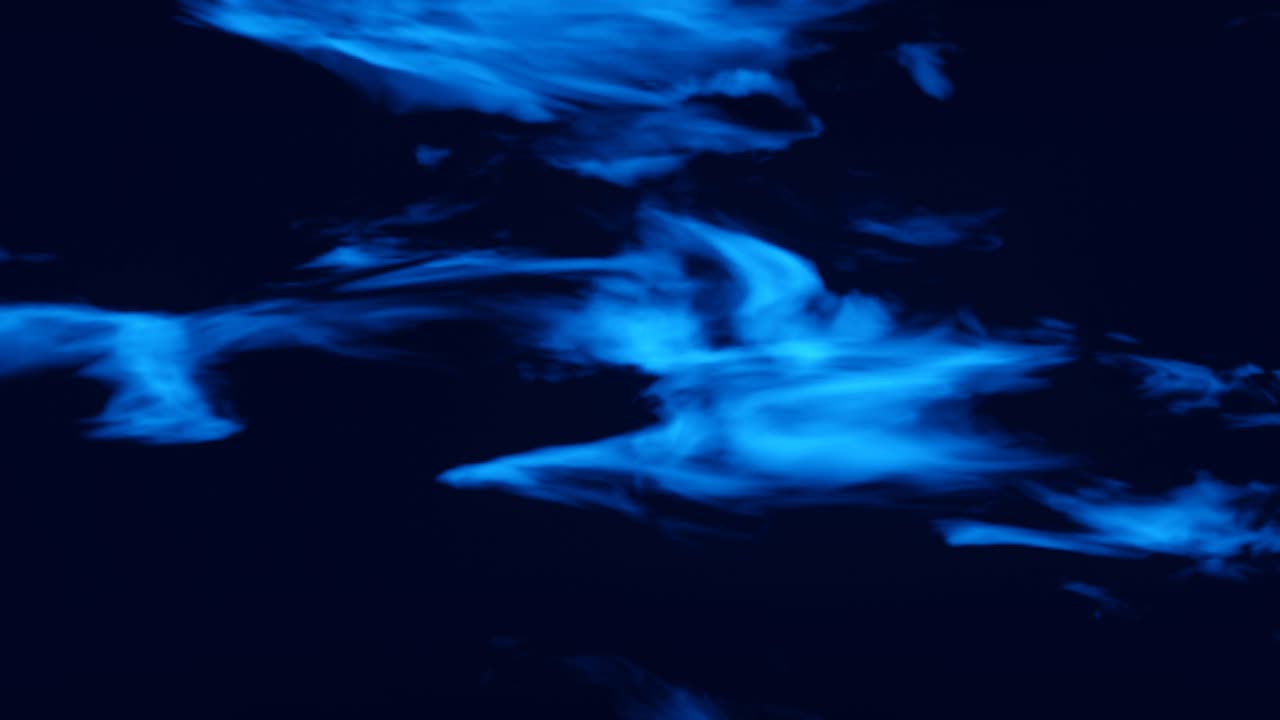 Seamless loop 4K animation of rotation in glowing nebula clouds. Spiral infinite galaxy outer space travel. Space, star field, night, sky, dust background