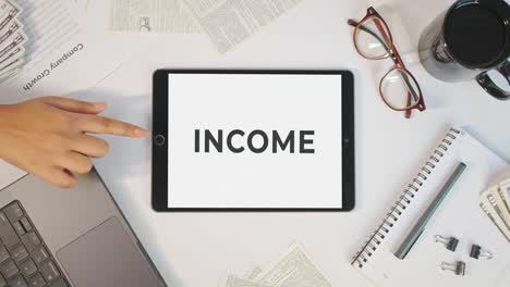 income displaying on a tablet screen