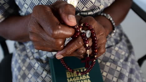 tired-hands-praying-the-rosary-I