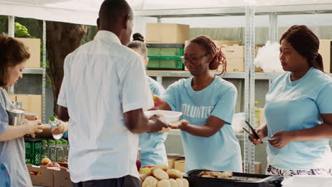 Women-Handing-Out-Food-To-The-Needy