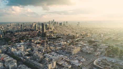 tel aviv skyline from drone. aerial shot long super wide horizon view. daytime sunset or early morning color sky coastline and office building in a modern tel aviv