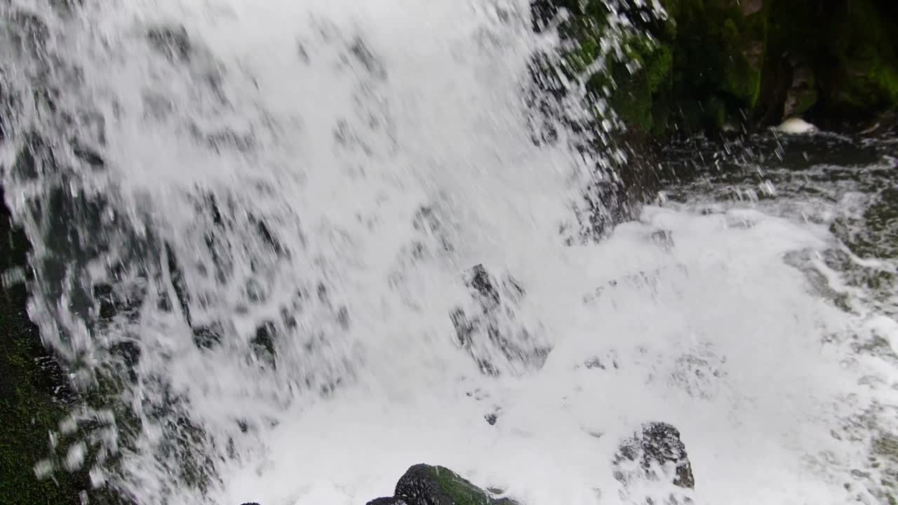 Waterfall Splashing Over Rocks