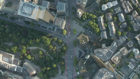 AERIAL:-Overhead-City-From-Above-View-of-Frankfurt-am-Main-Center-Streets-with-Skyscraper-Roof-in-Summer-light