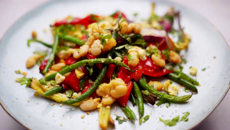 Plate-of-roasted-beans-rotating