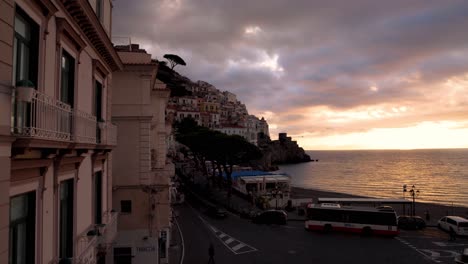 timelapse of amalfi, italy sunrise with sun and clouds