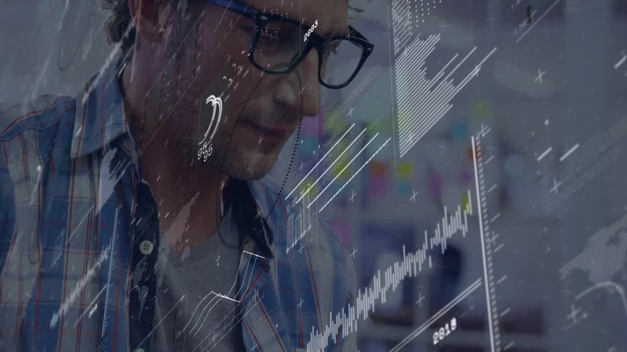 Male analyst typing on laptop in office, projecting animated tech charts world map overlays