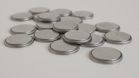 button battery pile close-up 4k tilting footage