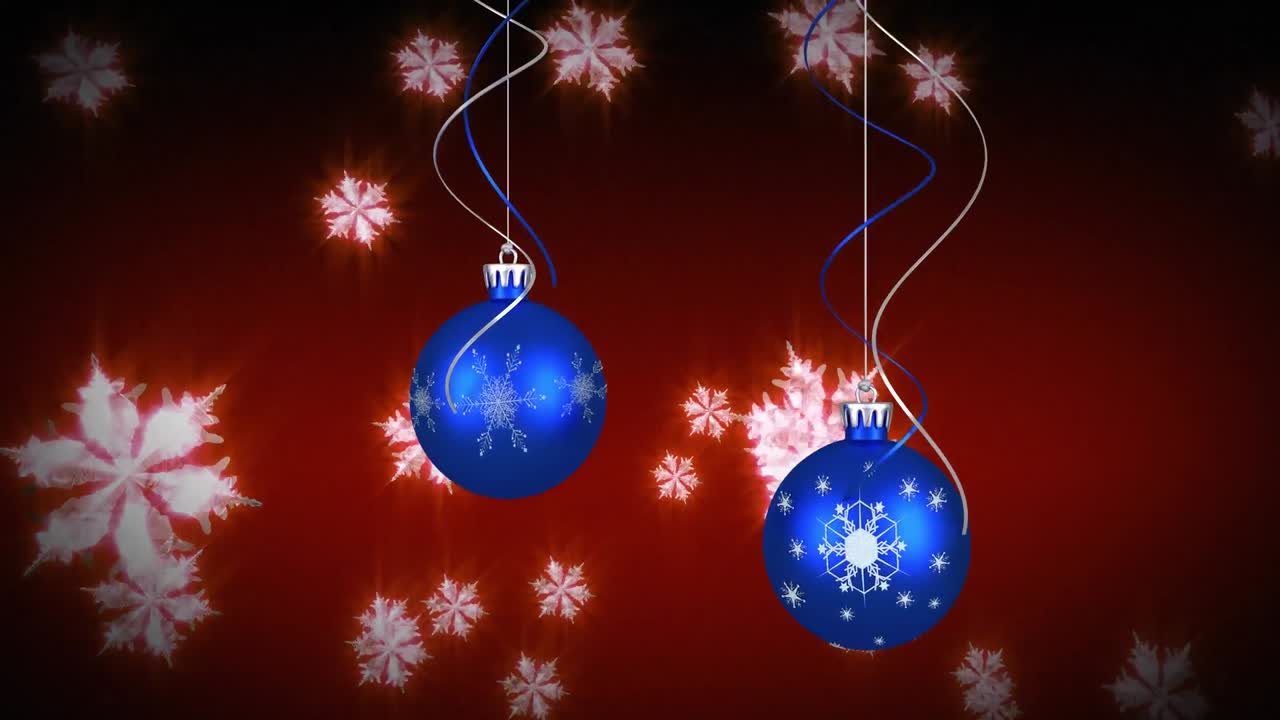 animación de nieve cayendo sobre las bolas de navidad