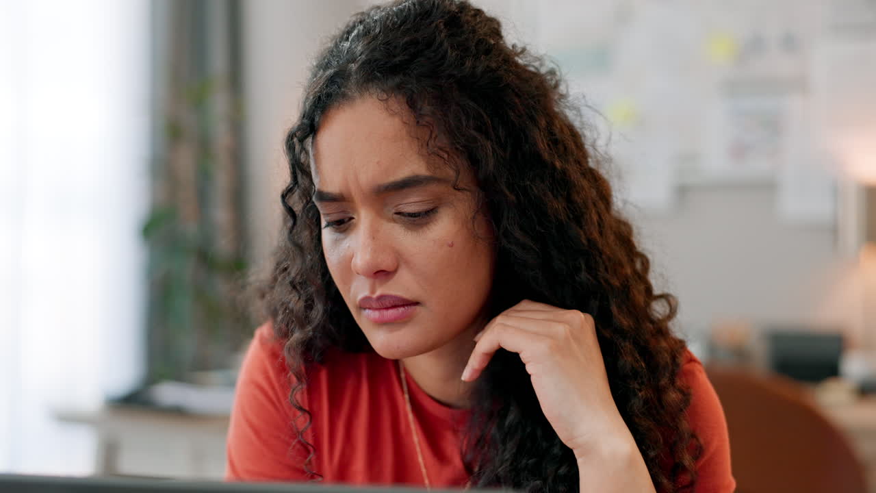 Business woman, frustrated and thinking by laptop