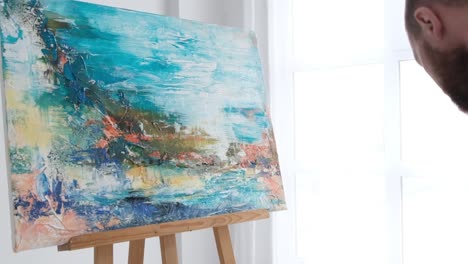 super slow motion 240 fps creative artist paints an abstract picture with colorful paints - super slow motion 240 fps, creative artist paints an abstract picture with colorful paints. contemporary works of art on canvas