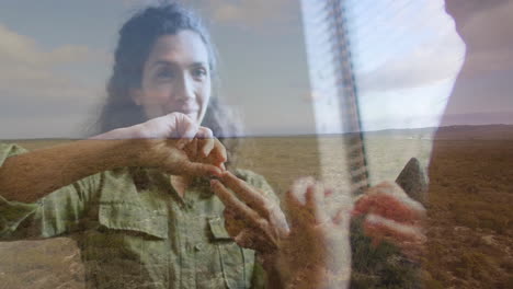 woman teaching sign language to child in education scene, showing grassland vertical blinds overlay