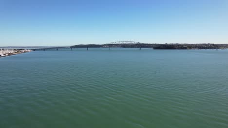 Flying-Towards-Auckland-Harbor-Bridge-In-New-Zealand---Drone-Shot