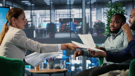 vertical video diverse company leaders discuss business development with performance data