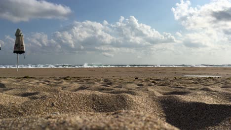 stormy sea, windy weather, waves on the beach, cloudy sky