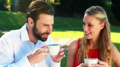 Couple-having-coffee-in-outdoor-restaurant-4k