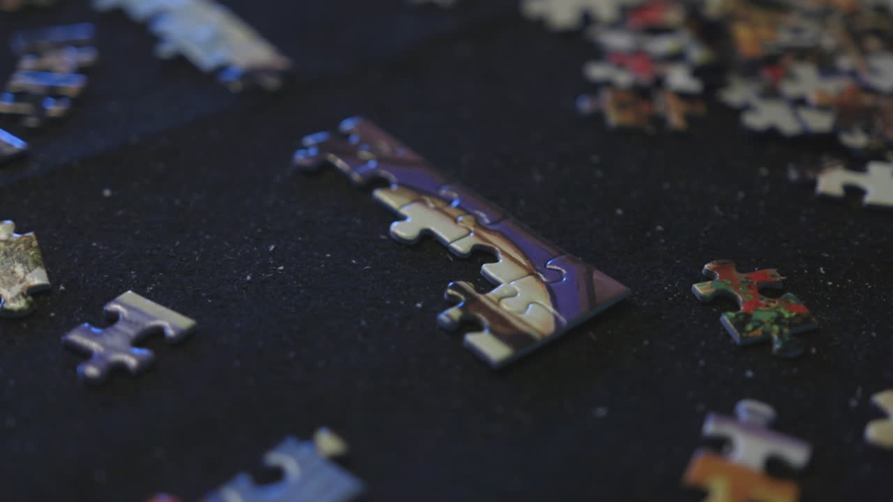 An unsolved puzzle on a large felt mat